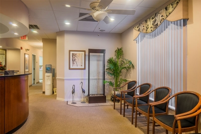 Inside of waiting area with seating, alternate view
